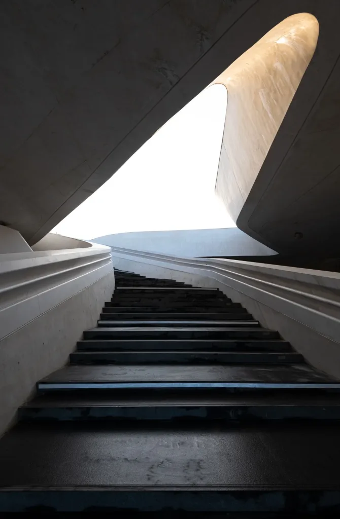 modern-architecture-and-empty-staircase-leading-to-a-bright-open-space-1.webp
